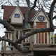 Illustration for article titled Awesome Grandparents Created Ridiculously Awesome Tree House Mansion for Their Grandkids